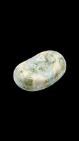 Polished moss agate tumbled stone with green and blue patterns, isolated on transparent background, ready for stickers, print on demand, and t-shirt design use.
