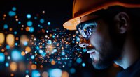 Young African American man in construction helmet with glowing blue particles and bokeh lights creating magical atmosphere in dark environment.