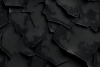 Dark abstract background with torn paper layers creating depth and shadow effect, geometric shapes overlap in monochromatic black design pattern.