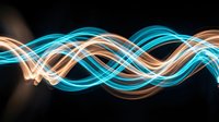 Glowing neon light waves in blue and orange intertwining across dark background, suitable for tech, energy, and modern design projects.