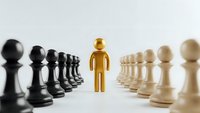 Golden figure standing between opposing black and white chess pieces representing leadership, mediation, and strategic business decisions.