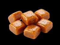 Soft caramel candy cubes isolated on transparent background, ready for t-shirt design, stickers, clipart, print on demand, and sublimation projects.