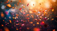 Vibrant orange and red confetti particles floating against dark background with bokeh light effects, creating magical festive atmosphere for celebration designs.