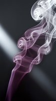 Ethereal wisps of purple and white smoke swirl gracefully against a dark background, creating an abstract flowing pattern. Use for backgrounds, overlays, and atmospheric design projects.