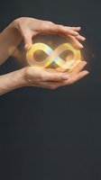 Hands protecting glowing infinity symbol representing endless possibilities, eternal protection, unlimited potential and continuous growth concepts.