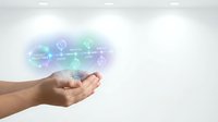 Human hands presenting holographic digital network with glowing icons and connections for technology and innovation concepts in business presentations.