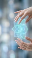 Female hands holding glowing cyan geometric mandala pattern against blurred background. Represents energy healing, wellness technology, spiritual growth, and holistic medicine practices.