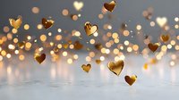 Golden hearts floating above white marble surface with warm bokeh lights creating romantic Valentine's Day atmosphere for greeting cards and love designs.
