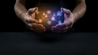 Hands protecting glowing digital network connections with orange and blue light effects representing cybersecurity, data protection and technology innovation.