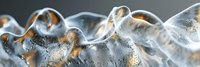 Clear ice cubes with water droplets melting on reflective surface creating refreshing cold beverage background for summer drinks and cooling concepts.
