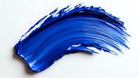 Blue paint stroke on white background, dynamic brushstroke texture with vibrant ultramarine pigment showing artistic movement and expressive gesture. Isolated for creative design.