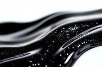 Abstract black and white fluid waves with glitter particles floating in dark space create dynamic flowing motion effect for luxury design background.