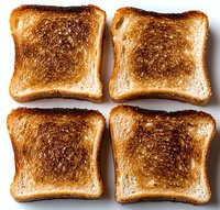 Four slices of golden-brown toast arranged in square formation on white background, showing varying degrees of toasting and crispy texture, isolated for food photography.
