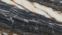 Natural marble stone texture with dramatic black, white and gold veining patterns for luxury interior design and architectural applications.