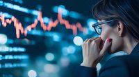 Businesswoman with glasses analyzing financial market data on digital screen, contemplating investment strategy in dark office environment.