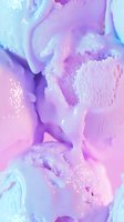 Dreamy pastel marble texture with swirling pink, purple, and blue hues creates ethereal abstract background with glitter accents and fluid art effects.