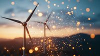 Wind turbines silhouetted against sunset sky with magical bokeh light effects and sparkles creating dreamy renewable energy concept for sustainability.