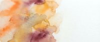 Abstract watercolor background with warm orange yellow purple paint blends flowing organically across white paper creating soft artistic texture for creative projects.
