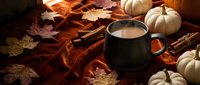 Cozy autumn scene with steaming coffee mug, white pumpkins, cinnamon sticks and fallen leaves on rustic wooden surface for seasonal marketing and fall decor.