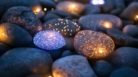Glowing river stones with magical sparkles and warm lights creating enchanting atmosphere for meditation, spa treatments, wellness centers, and relaxation spaces.
