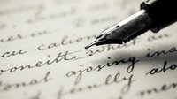 Fountain pen nib writing on handwritten manuscript text, close-up detail of calligraphy and ink on paper for writing, literature, and correspondence projects.