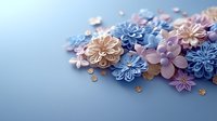 Delicate paper flowers in soft pink and blue tones with golden accents arranged on blue background, creating romantic composition for wedding and celebration designs.