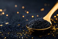 Black caviar on wooden spoon against dark background with golden bokeh lights and scattered caviar, luxury gourmet food styling for restaurant menu and fine dining.