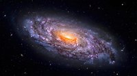 Spectacular spiral galaxy with glowing orange core and purple-blue arms against starry space background for astronomy and science projects.