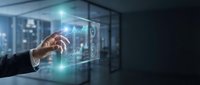 Businessman hand touching digital holographic display with financial charts and data analytics in modern office environment for business technology concepts.