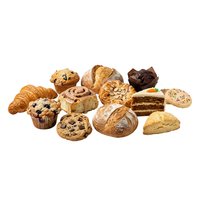 Assorted fresh baked goods including croissants, muffins, cookies, and artisan bread loaves isolated on white background for bakery, cafe, and food service design projects.