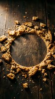 Crumbled cookies and baked goods scattered in circular frame on dark wooden surface, ideal for food photography, baking blogs, recipe websites, and culinary content.