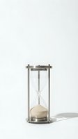 Hourglass with metallic frame and flowing sand on white background, isolated and ready for design use on merchandise, websites, and marketing materials.