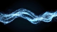 Glowing blue wave of magical particles and sparkles flowing on black background, abstract light effect for modern digital design and motion graphics.