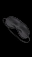 Black silk sleep mask isolated on transparent background, ready for e-commerce, product mockups, retail packaging, and promotional designs for wellness and lifestyle brands.