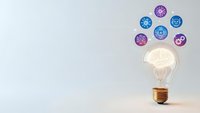 Glowing light bulb with brain filament and floating virus icons on white background representing medical innovation and healthcare technology solutions.