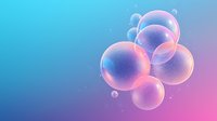 Translucent soap bubbles floating on gradient blue and pink background with soft bokeh effect and delicate light reflections, creating dreamy atmosphere.