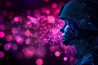 Profile silhouette of person with glowing network connections emerging from face against pink and purple bokeh background, representing artificial intelligence.