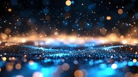 Magical glowing blue and gold bokeh lights create dreamy abstract background with sparkles and blurred particles floating in dark space. Festive atmosphere.