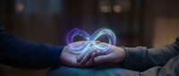 Two hands cupped together holding glowing infinity symbol representing endless possibilities, partnership, and eternal connection in business collaboration.