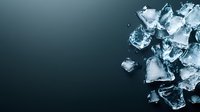 Scattered ice cubes on dark background with dramatic lighting and copy space, frozen water crystals creating modern minimalist composition for beverage and cooling concepts.