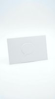 Tilted white card with embossed speech bubble icon on light background, isolated design element suitable for communication, messaging, dialogue, and conversation concepts in web and print projects.