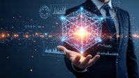 Businessman holding glowing geometric network structure with data analytics charts and graphs floating above palm in futuristic digital technology concept.