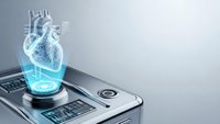 Futuristic medical device displaying holographic human heart anatomy with blue glowing projection for healthcare technology and diagnostic equipment applications.