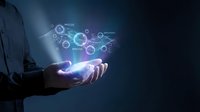 Businessman holding glowing digital network interface with connected nodes and data visualization symbols, representing technology, innovation, and digital transformation solutions.