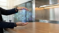 Business professional displaying holographic digital network interface with glowing data connections in modern office environment for technology presentations.