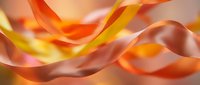 Abstract flowing ribbons in warm orange and yellow tones creating dynamic waves and curves for modern design backgrounds and creative projects.