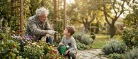 Senior Caucasian grandfather teaching young grandson gardening skills with watering can in sunny backyard garden during golden hour family bonding time.