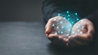 Hands holding glowing digital network globe with connected lines and nodes, representing global connectivity, data exchange, and technology innovation for business solutions.