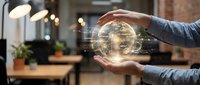 Hands holding glowing globe with digital network connections in modern office workspace, representing global business, technology innovation, and international commerce.