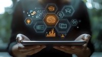 Business professional holding tablet with digital technology icons including brain, charts, and data analytics symbols floating above screen.